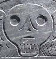 Death Head on the gravestone of Mrs. Macolm (1762).